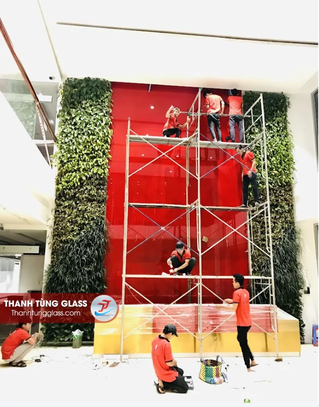 Ốp kính sơn đỏ cho công ty Điện Quang khu công nghệ cao